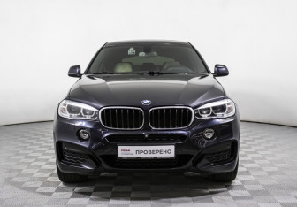 Подержанный автомобиль BMW X6 2015 года (2 фото)