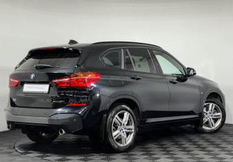 Подержанный автомобиль BMW X1 2018 года (2 фото)