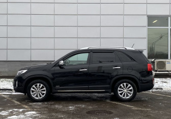 Подержанный автомобиль Kia Sorento 2013 года (8 фото)