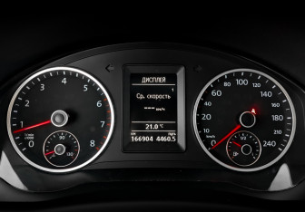 Подержанный автомобиль Volkswagen Tiguan 2016 года (13 фото)