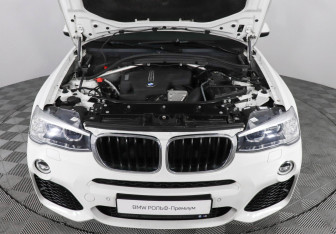 Подержанный автомобиль BMW X4 2016 года (10 фото)