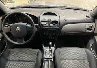 Подержанный автомобиль Nissan Almera Classic 2010 года (12 фото)