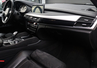 Подержанный автомобиль BMW X6 2016 года (9 фото)