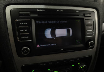 Подержанный автомобиль Skoda Octavia Liftback 2011 года (16 фото)