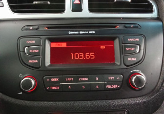 Подержанный автомобиль Kia Ceed Wagon 2013 года (14 фото)