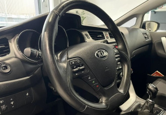 Подержанный автомобиль Kia Ceed Wagon 2014 года (13 фото)