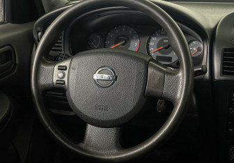 Подержанный автомобиль Nissan Almera Classic 2012 года (14 фото)