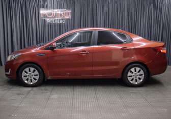 Подержанный автомобиль Kia Rio Sedan 2013 года (8 фото)
