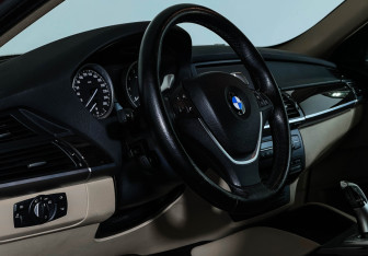 Подержанный автомобиль BMW X6 2009 года (11 фото)