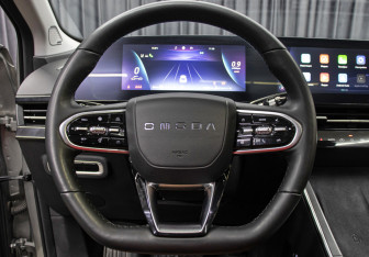 Подержанный автомобиль Omoda C5 2022 года (17 фото)