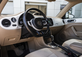 Подержанный автомобиль Volkswagen Beetle Hatchback 2014 года (9 фото)