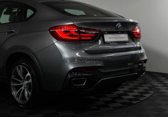 Подержанный автомобиль BMW X6 2017 года (21 фото)