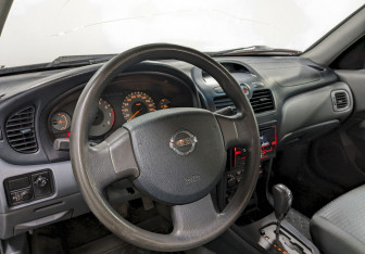 Подержанный автомобиль Nissan Almera Classic 2007 года (13 фото)