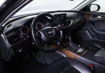 Подержанный автомобиль Audi A6 Sedan 2015 года (15 фото)