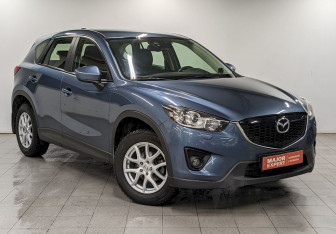 Подержанный автомобиль Mazda CX-5 2015 года (3 фото)