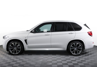 Подержанный автомобиль BMW X5 2014 года (8 фото)