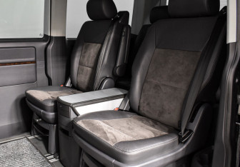 Подержанный автомобиль Volkswagen Multivan 2015 года (13 фото)