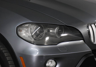 Подержанный автомобиль BMW X5 2009 года (7 фото)