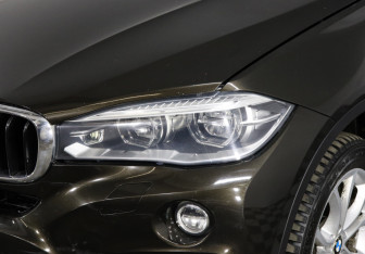 Подержанный автомобиль BMW X6 2015 года (7 фото)