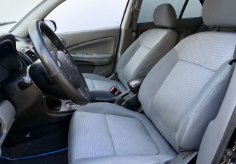 Подержанный автомобиль Nissan Almera Classic 2012 года (10 фото)