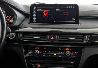 Подержанный автомобиль BMW X6 2016 года (17 фото)