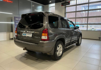 Подержанный автомобиль Mazda Tribute 2003 года (4 фото)