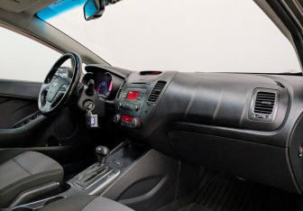 Подержанный автомобиль Kia Cerato Sedan 2014 года (27 фото)