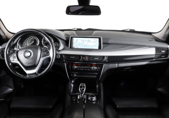 Подержанный автомобиль BMW X6 2015 года (13 фото)