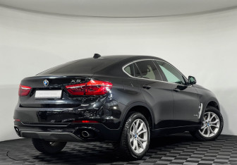 Подержанный автомобиль BMW X6 2016 года (2 фото)