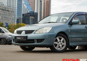 Подержанный автомобиль Mitsubishi Lancer Wagon 2007 года (15 фото)