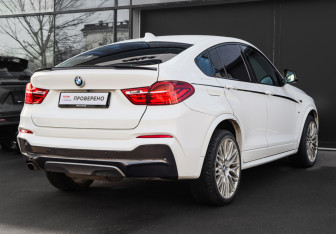 Подержанный автомобиль BMW X4 2015 года (4 фото)