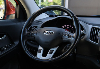 Подержанный автомобиль Kia Sportage 2012 года (11 фото)