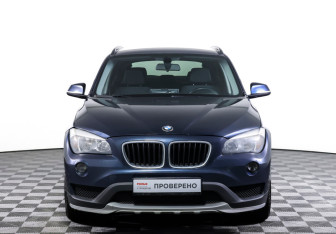 Подержанный автомобиль BMW X1 2014 года (2 фото)