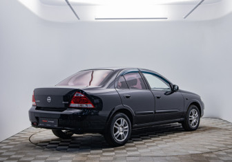 Подержанный автомобиль Nissan Almera Sedan 2012 года (5 фото)