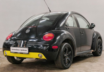 Подержанный автомобиль Volkswagen Beetle Hatchback 1999 года (6 фото)