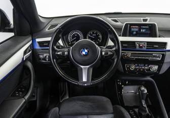 Подержанный автомобиль BMW X1 2018 года (11 фото)