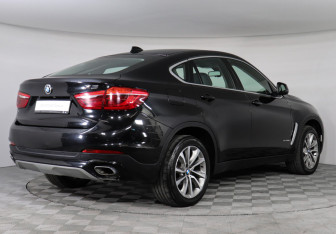 Подержанный автомобиль BMW X6 2017 года (2 фото)
