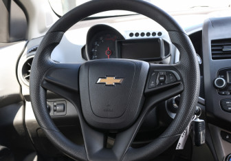 Подержанный автомобиль Chevrolet Aveo Sedan 2013 года (17 фото)
