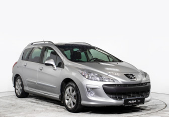 Подержанный автомобиль Peugeot 308 Wagon 2010 года (3 фото)