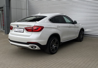 Подержанный автомобиль BMW X6 2016 года (5 фото)