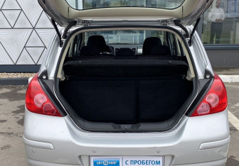 Подержанный автомобиль Nissan Tiida Hatchback 2010 года (10 фото)