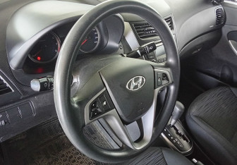 Подержанный автомобиль Hyundai Solaris Sedan 2014 года (12 фото)