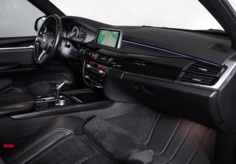 Подержанный автомобиль BMW X5 2015 года (10 фото)