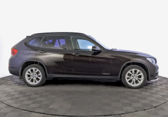 Подержанный автомобиль BMW X1 2014 года (4 фото)