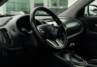 Подержанный автомобиль Kia Sportage 2012 года (13 фото)