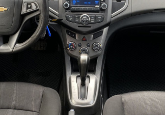 Подержанный автомобиль Chevrolet Aveo Sedan 2012 года (12 фото)