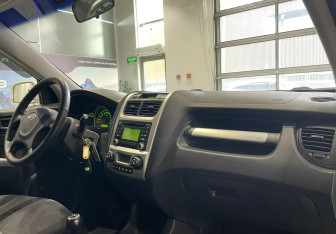 Подержанный автомобиль Kia Sportage 2010 года (10 фото)