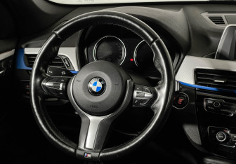 Подержанный автомобиль BMW X1 2018 года (15 фото)