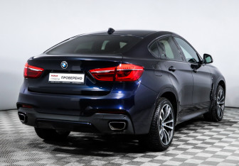 Подержанный автомобиль BMW X6 2016 года (5 фото)