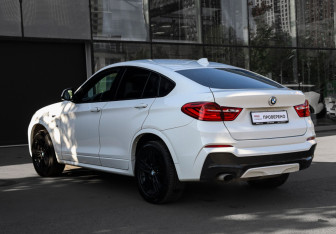 Подержанный автомобиль BMW X4 2015 года (7 фото)